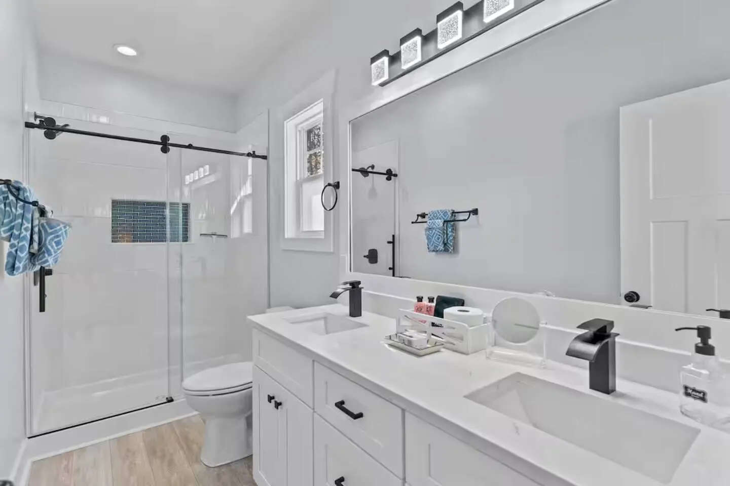 En-suite bathroom with a glass walk-in shower and double vanity